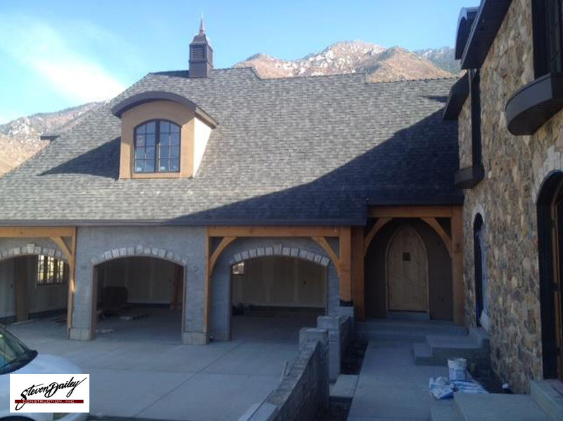 Asphalt shingle roof with mountain backdrop